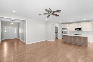 Welcome to Woodland Ridge! Built in 2022, this thoughtfully - photo 5