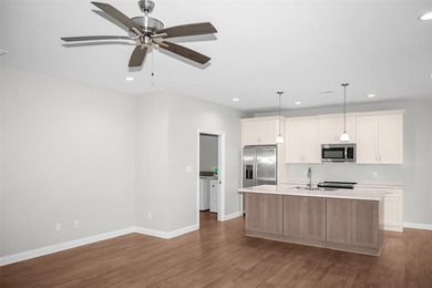 Welcome to Woodland Ridge! Built in 2022, this thoughtfully - photo 8