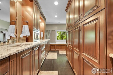 This exceptional custom home sits directly across from the - photo 25