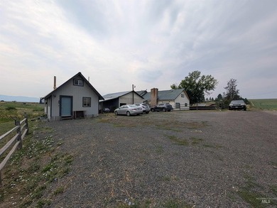 Excellent investment opportunity on 3.6 private acres tucked off