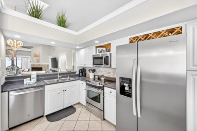 STUNNING UPSTAIRS CONDO WITH SWEEPING BAY & MARINA VIEWS IN - photo 9