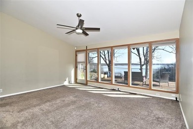 A stunning lake view welcome's you the moment you step inside - photo 11