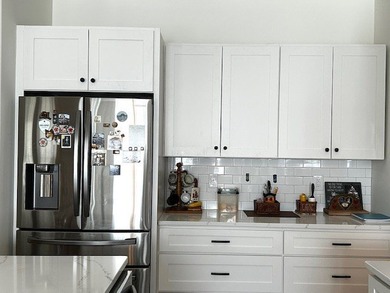 This *better than new* home combines the pristine condition of a - photo 12