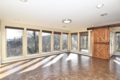 A stunning lake view welcome's you the moment you step inside - photo 13