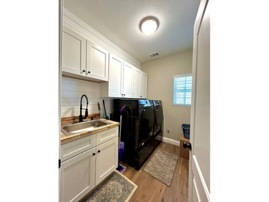 This *better than new* home combines the pristine condition of a - photo 18