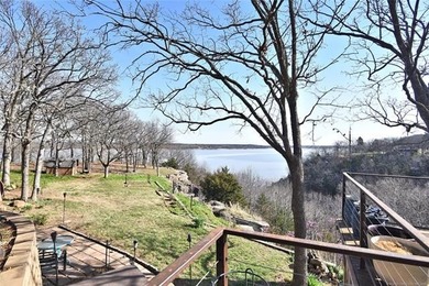 A stunning lake view welcome's you the moment you step inside - photo 25