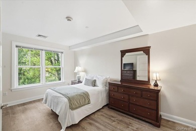 A refined one-bedroom residence at Sweetwater offering - photo 9