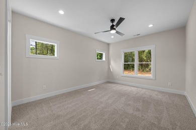 Be the first owner of this beautiful Treweek Construction Home! - photo 24