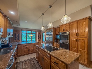 Enjoy peaceful waterfront living in this beautifully maintained - photo 17