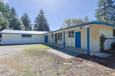 Lake Home For Sale in Coquille, Oregon