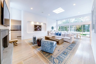 On a quiet lane, this newly renovated home blends modern design - photo 3