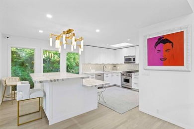 On a quiet lane, this newly renovated home blends modern design - photo 9