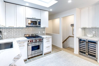 On a quiet lane, this newly renovated home blends modern design - photo 10