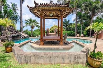Set on 2 acres of lush, tropical grounds, this is a gorgeous - photo 28