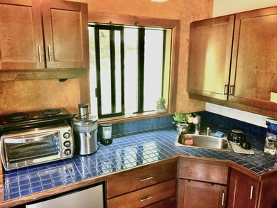 Set on 2 acres of lush, tropical grounds, this is a gorgeous - photo 37