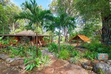 Set on 2 acres of lush, tropical grounds, this is a gorgeous - photo 39