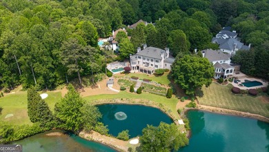 Nestled in the heart of Sandy Springs, this extraordinary - photo 2