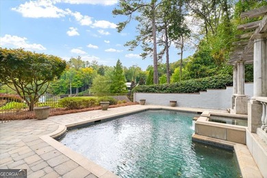 Nestled in the heart of Sandy Springs, this extraordinary - photo 9