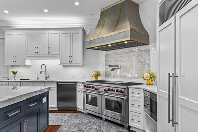 NEWLY RENOVATED AND MOVE IN READY, THIS 9,000 SQ. FT. RESIDENCE