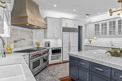 NEWLY RENOVATED AND MOVE IN READY, THIS 9,000 SQ. FT. RESIDENCE