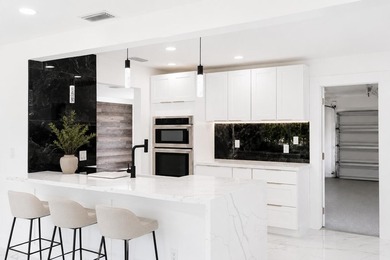 WELCOME TO YOUR FULLY REMODELED SOUTH FLORIDA RETREAT IN THE - photo 16