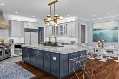 NEWLY RENOVATED AND MOVE IN READY, THIS 9,000 SQ. FT. RESIDENCE