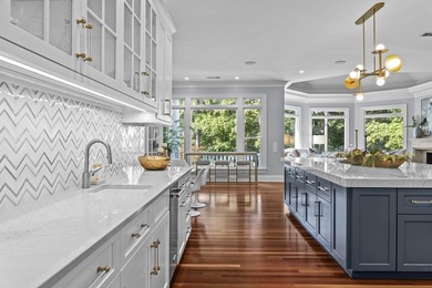 NEWLY RENOVATED AND MOVE IN READY, THIS 9,000 SQ. FT. RESIDENCE