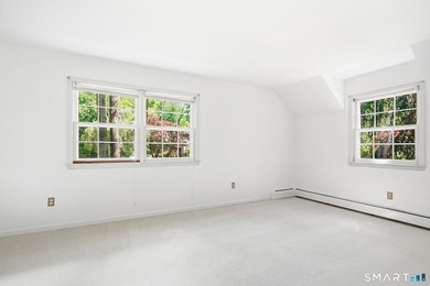 Privately sited on a flat .39-acre lot with mature landscaping - photo 26