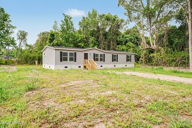 BRAND NEW mobile home with .5 acres! This spacious 4-bedroom - photo 2