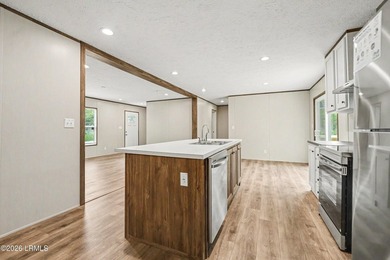 BRAND NEW mobile home with .5 acres! This spacious 4-bedroom - photo 6
