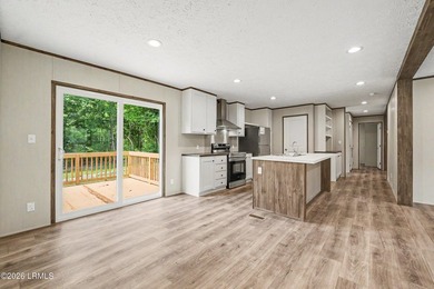 BRAND NEW mobile home with .5 acres! This spacious 4-bedroom - photo 9