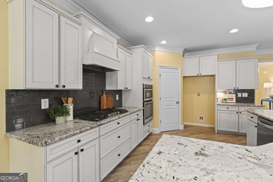Welcome home to this beautifully appointed primary-on-main - photo 4