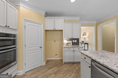 Welcome home to this beautifully appointed primary-on-main - photo 7