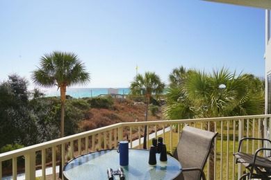 Experience coastal living at its finest with this gulf-front - photo 1