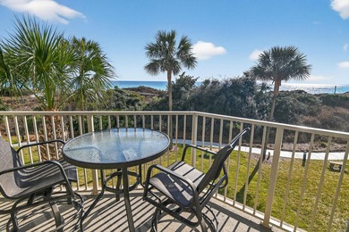 Experience coastal living at its finest with this gulf-front - photo 5