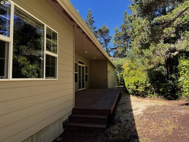 Nestled in a peaceful wooded setting within the desirable Heceta - photo 37