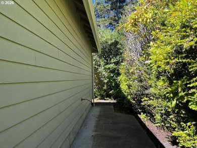 Nestled in a peaceful wooded setting within the desirable Heceta - photo 39