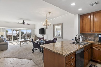 Experience coastal living at its finest with this gulf-front - photo 10