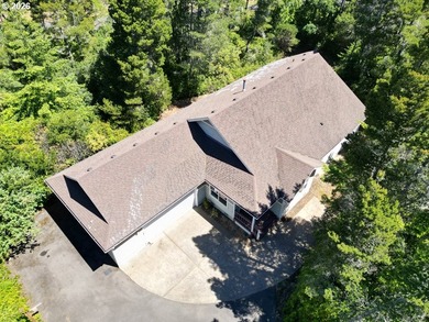 Nestled in a peaceful wooded setting within the desirable Heceta - photo 43