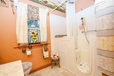 Looking for a relaxing homestead? This well-built brick home