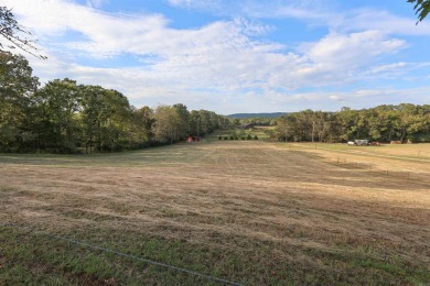 Looking for a relaxing homestead? This well-built brick home