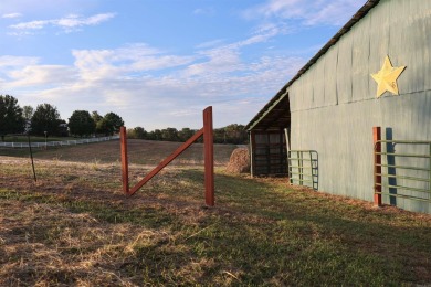 Looking for a relaxing homestead? This well-built brick home