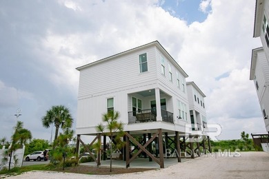 Experience coastal living at its finest with this beautifully - photo 1