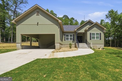 Discover this stunning four-bedroom, three-bath home located in - photo 1