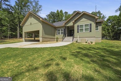 Discover this stunning four-bedroom, three-bath home located in - photo 4