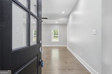 Discover this stunning four-bedroom, three-bath home located in - photo 6