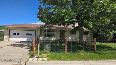 Welcome to this inviting single-family home on the desirable - photo 1
