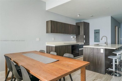 Step into refined luxury with this exquisite 2-bedroom + Den