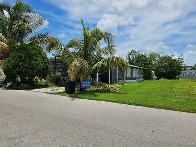 Lake Home For Sale in North Fort Myers, Florida