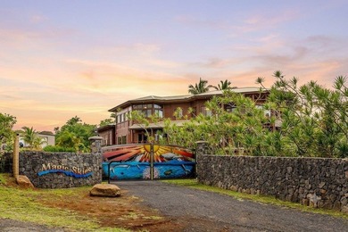 Set on 9.63 acres outside Hilo, this furnished 8-bedroom, 8-bath - photo 1